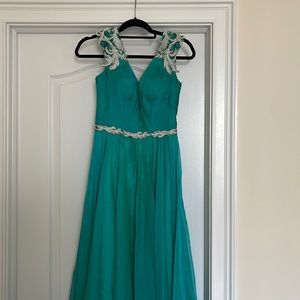 Siize 4 green chiffon dress. With low back and pearl detail beading.